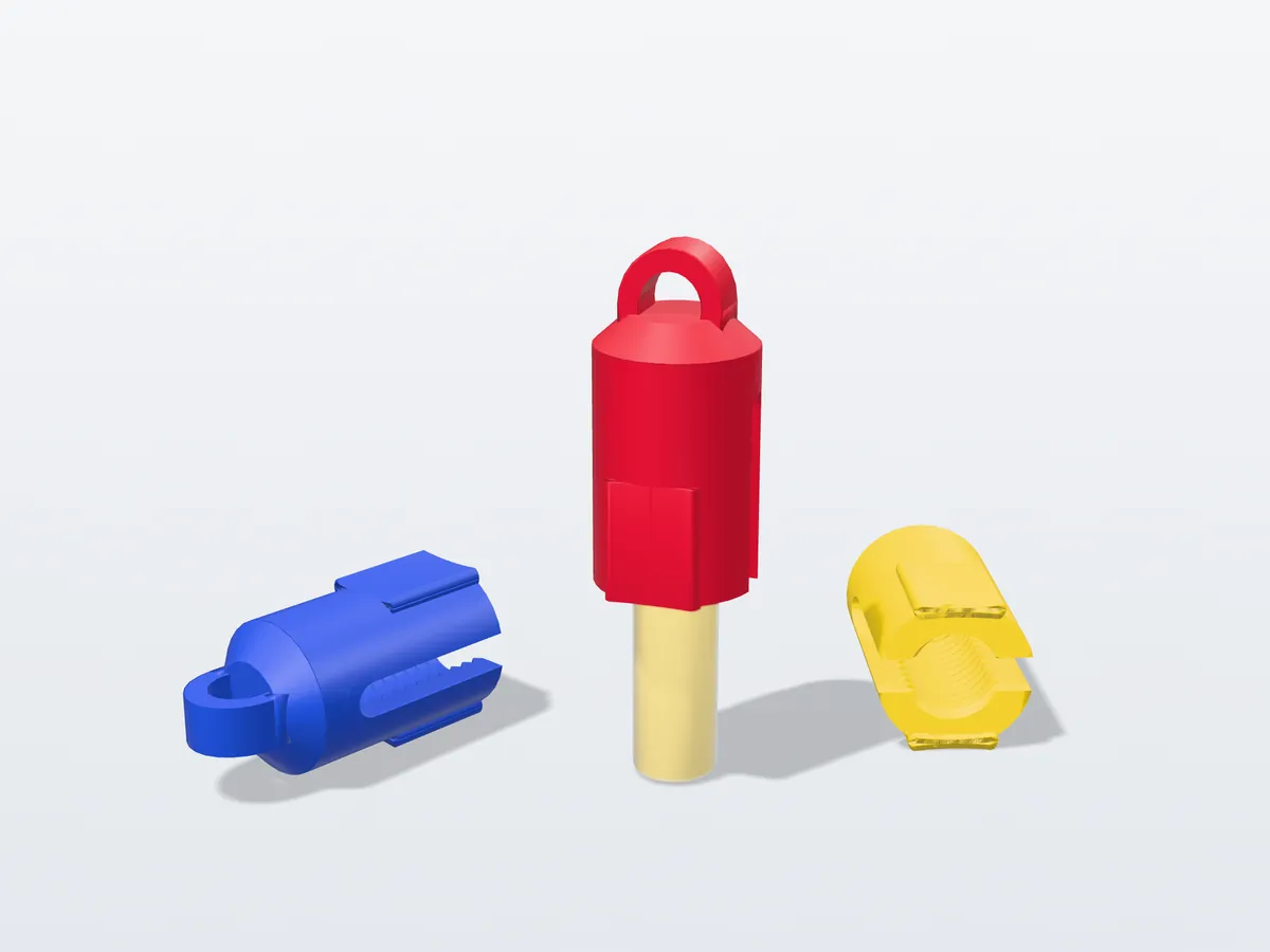 QuickAid Ampullenbrecher in Rot, Blau und Gelb mit Glasampulle